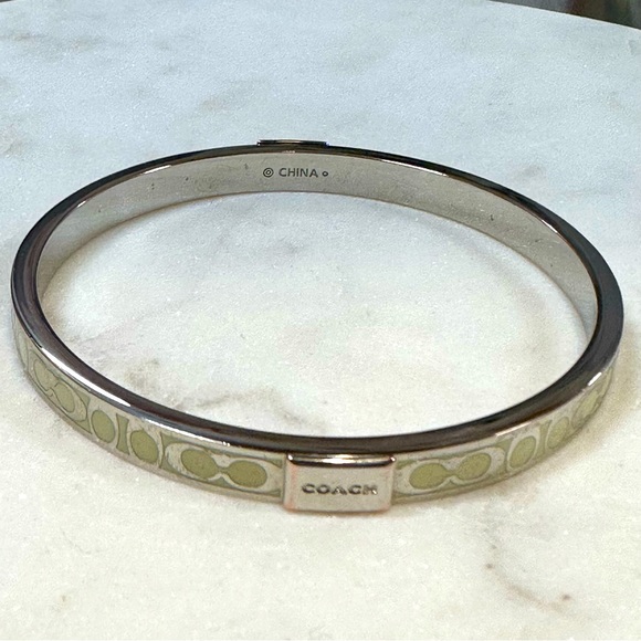 COACH - Signature C Cream Enameled Silver Bangle Bracelet - Picture 10 of 12